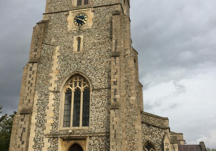 Elmdon church ChurchImages-Essex-Elmdon Ext A square flint tower with a clock