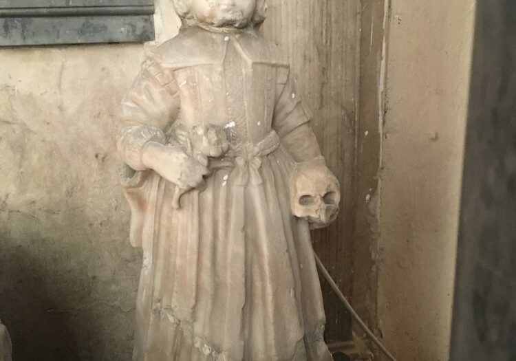 Colmworth effigy 1 Image shows a historic effigy within a church