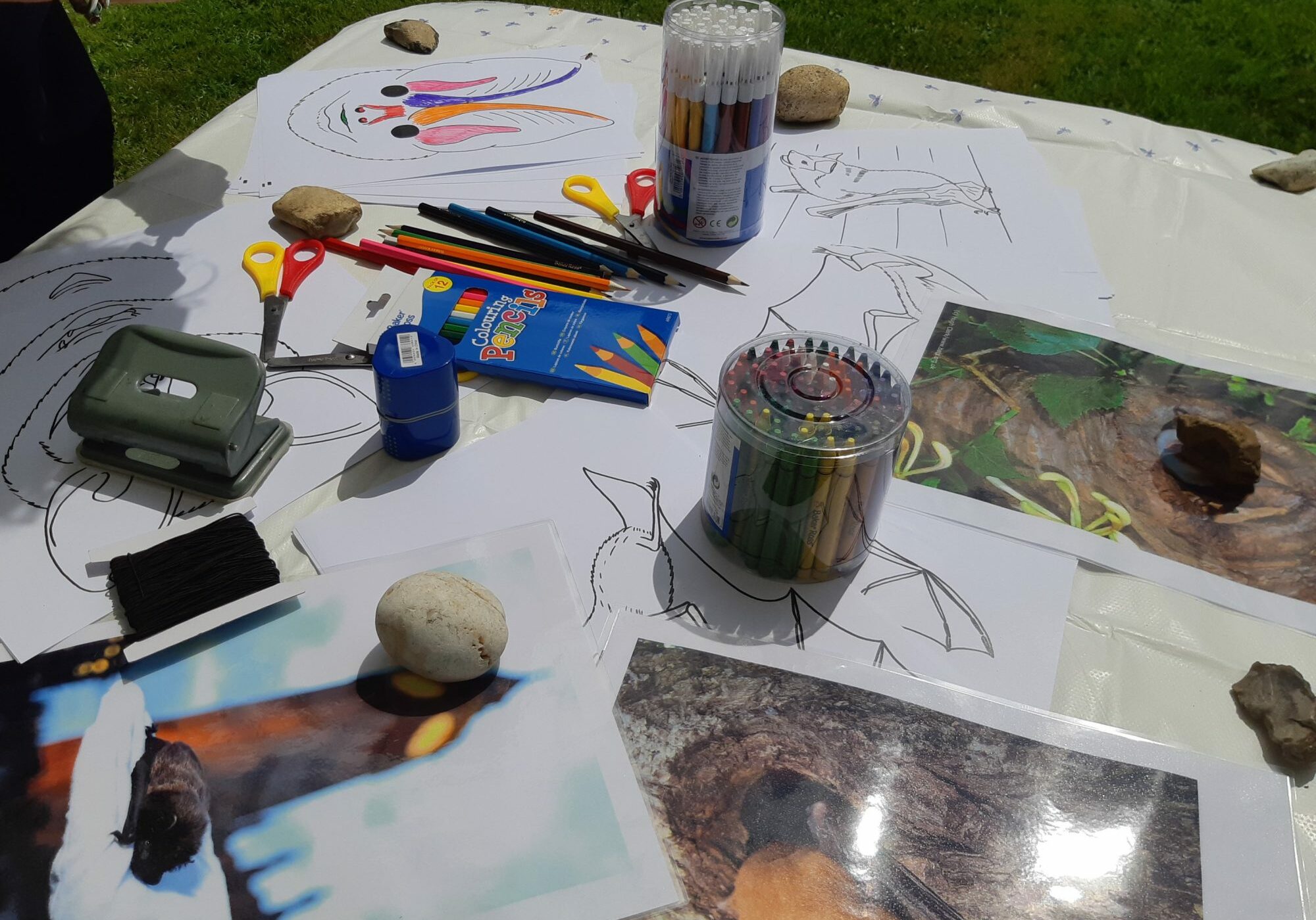A table with activities for children at a church fete