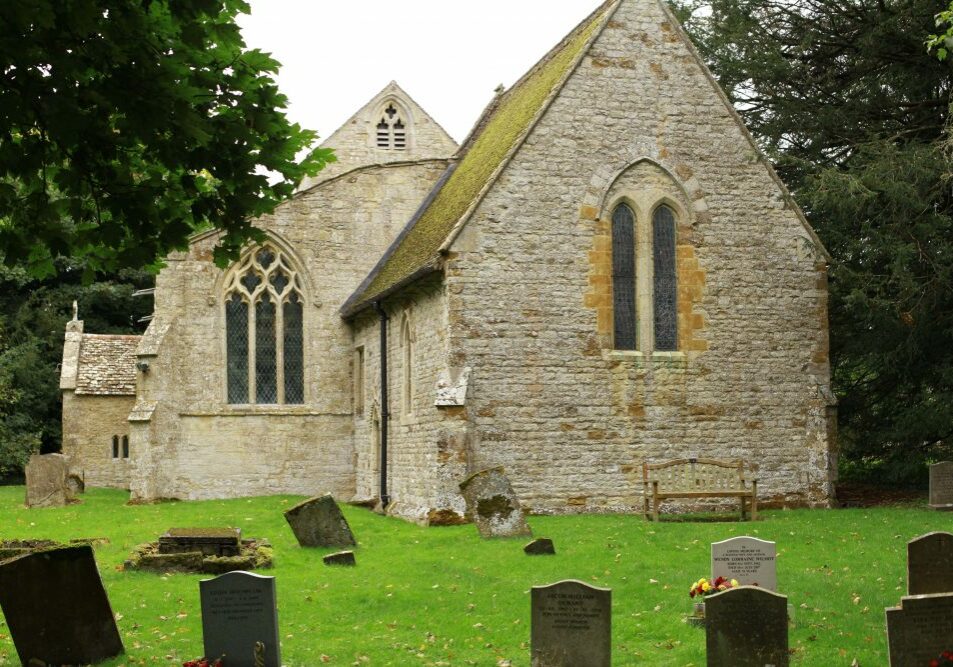 St Lawrence, Radstone exterior from east Stone church exterior from east with bench and gravestones