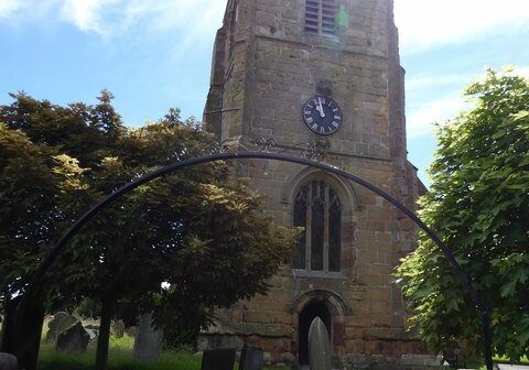 St Michael, Loppington Eiran Evans Church tower with clock and ironwork arch over gate