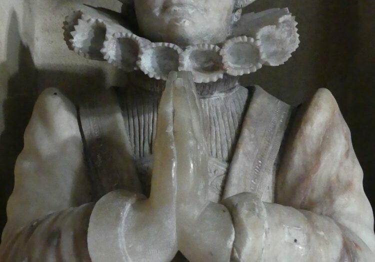 ChurchImages-Norfolk-Saxlingham-Lady Mirabelle An alabaster statue of a woman wearing a ruff and tudor gown, praying with clasped hands