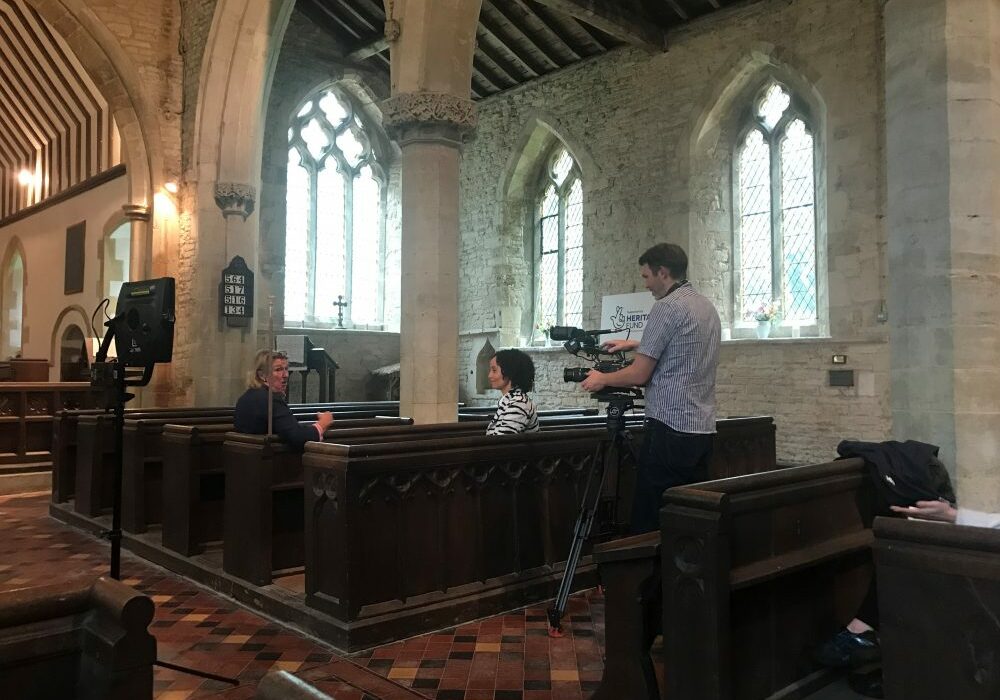 Songs of Praise at Radstone 2 BBC Songs of Praise presenter Gemma Hunt interviewing churchwarden Penny Bonner inside St Lawrence church