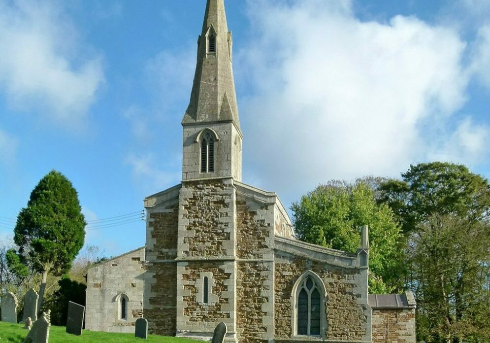 St Andrew-Coston-Alan Murray-Rust West end of stone church with delicate spire and Norman lancet window