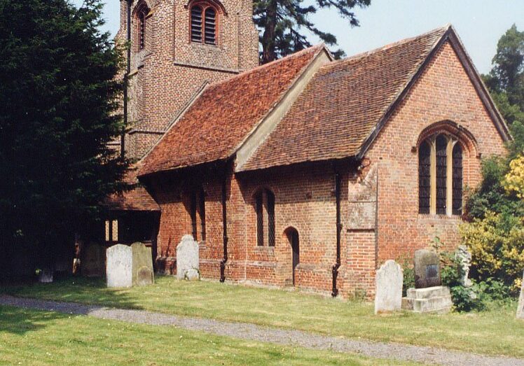 St Nicholas Chignal Smealey John Salmon The exterior of a small, sunlight red brick church with a square tower