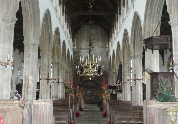ChurchImages-Norfolk Walpole Interior Small View down the aisle facing west, the church has a red tiled floor and six large arches in each arcade, topped by a clerestory