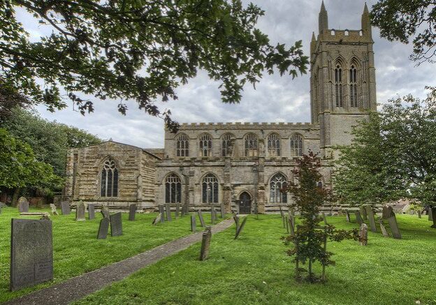St Andrew, Whissendine north side Stone church with tall bell tower and many windows
