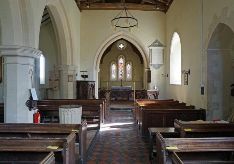 St Nicholas Fyfield churchimages-wilts-fyfield-StNicholas-ColinWest-nave church interior showing font and pews