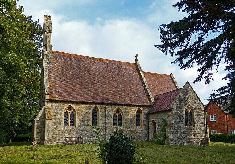 St Michael, North Piddle, Worcs - TudorBarlow Stone church with red tiled roof with door in south transept and bench